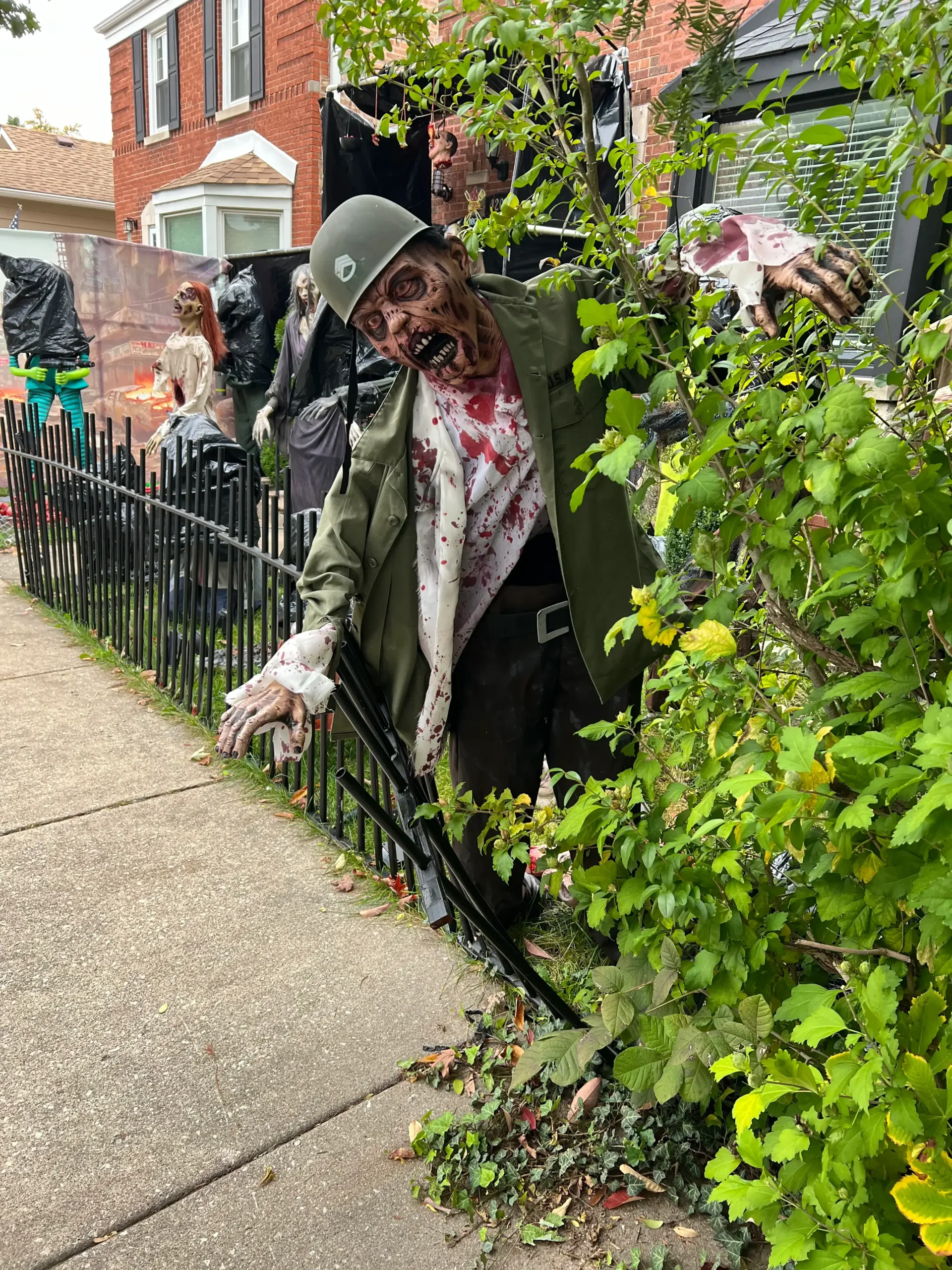 Spooky zombie soldier yard display installed by our Halloween Decorating Service Chicago