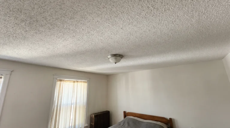 Popcorn ceiling asbestos question in a Chicago bedroom: textured white ceiling in an older home